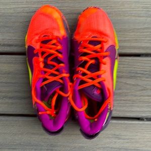 Brand Nike Color orange purple green size 5 1/2 super cozy basketball shoes.